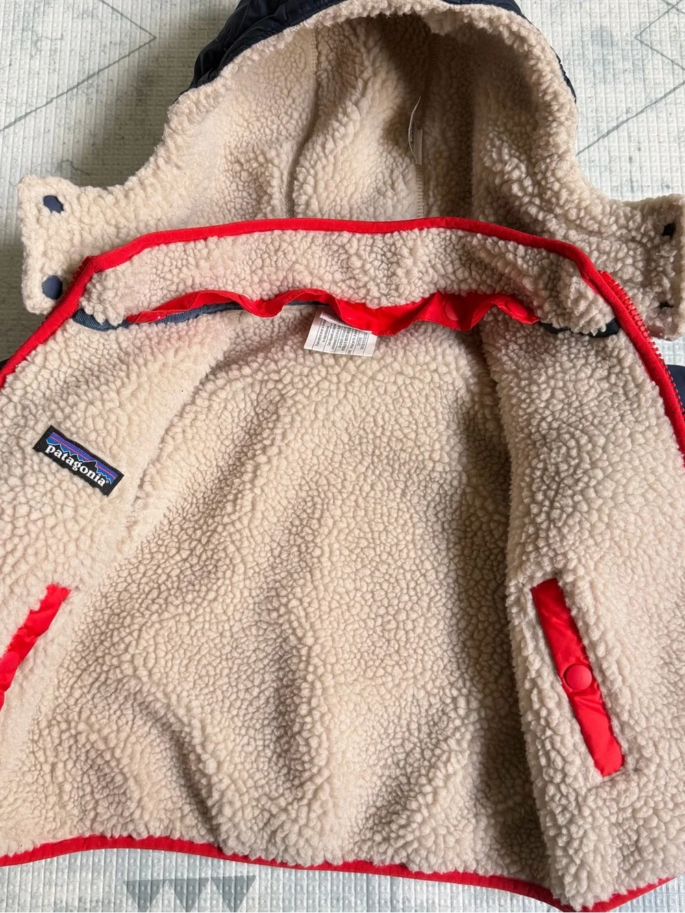 Patagonia Kids Navy Jacket with Red Trim and Cream Sherpa Lining